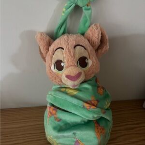Baby Nala in wrap from Disney World